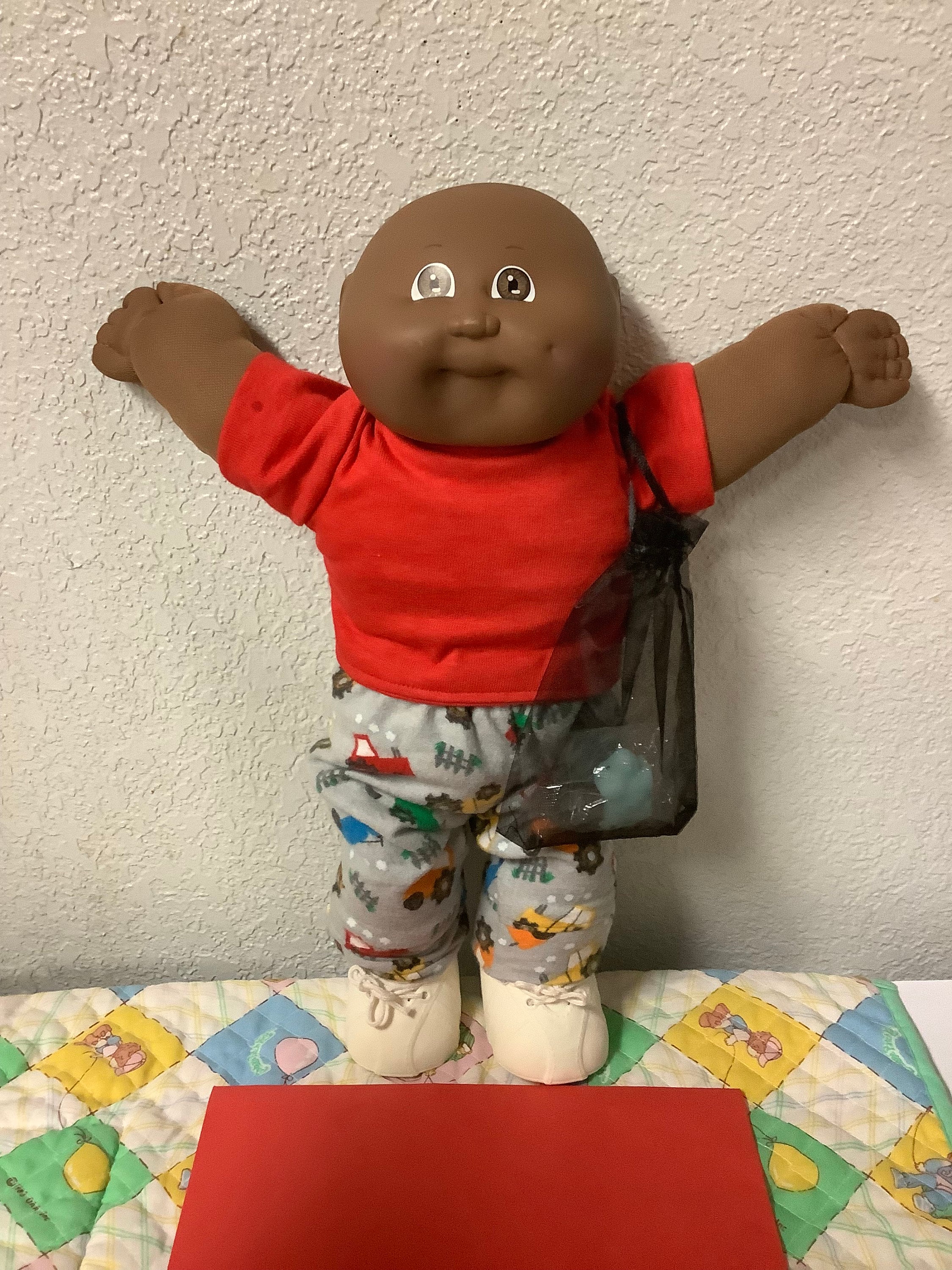 Black bald cabbage patch doll hotsell