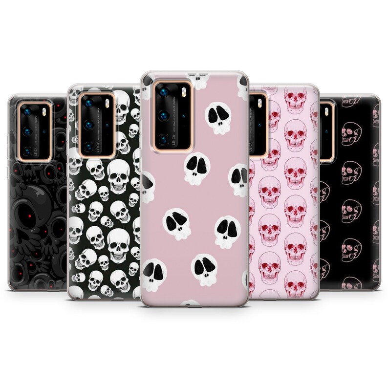 May include: Set of six phone cases with different skull designs. The cases are clear and show a pink, black, and white skull pattern.