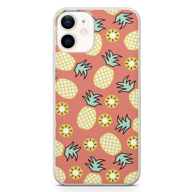 May include: A clear phone case featuring a repeating pattern of yellow pineapples and pineapple slices with green leaves on a coral background. The phone case is designed for an iPhone.