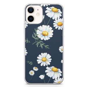 May include: Clear phone case with a dark blue background and a pattern of white daisies with yellow centers and green leaves. The phone case is designed to fit a smartphone.