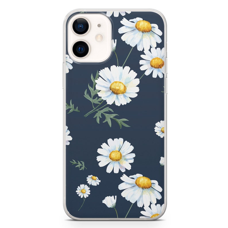 May include: Clear phone case with a dark blue background and a pattern of white daisies with yellow centers and green leaves. The phone case is designed to fit a smartphone.