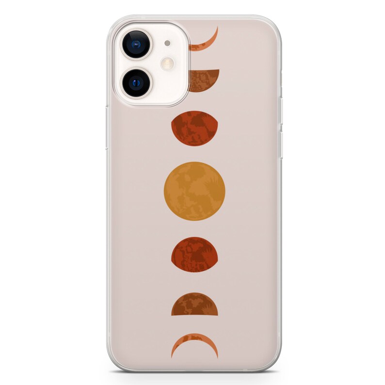 May include: A clear phone case with a design of a moon in various phases in shades of orange and brown on a light beige background.
