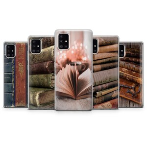 May include: Five different phone cases with images of old books. The cases are clear and show the images through the plastic. The images include a stack of books, a single book open, and a stack of books with a key.