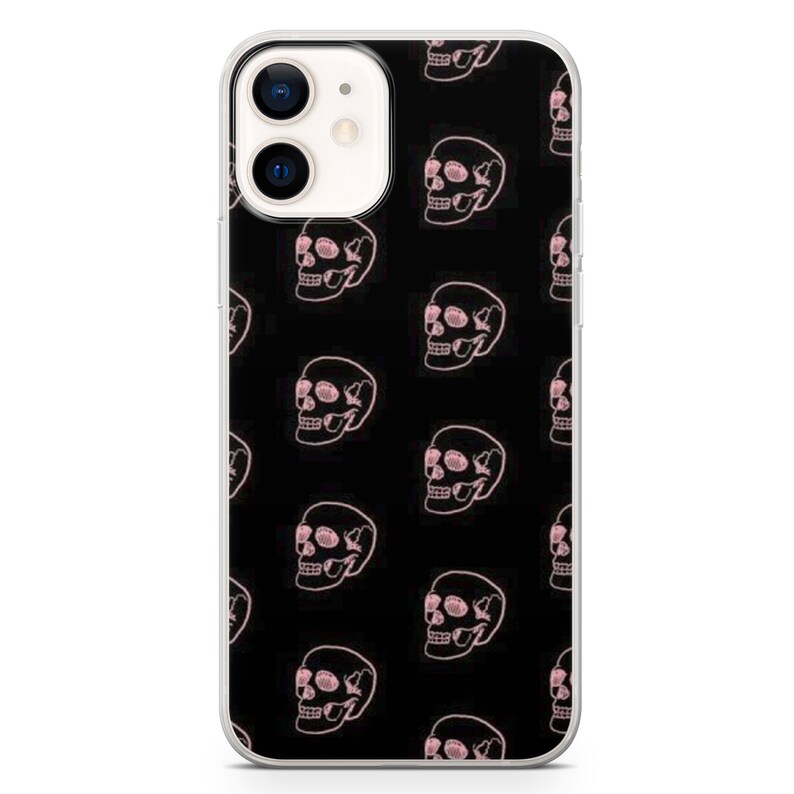 May include: A clear phone case with a black background and a repeating pattern of pink skulls.
