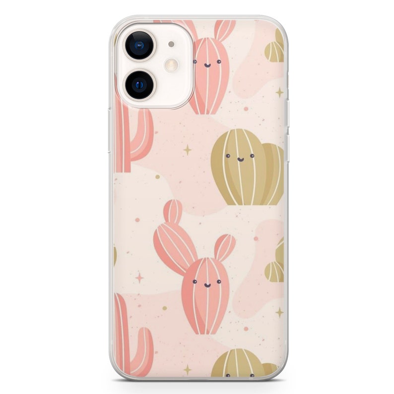 May include: Clear phone case featuring a repeating pattern of cartoon cacti in shades of pink and tan on a light pink background. The cacti have smiling faces and are interspersed with small star shapes.