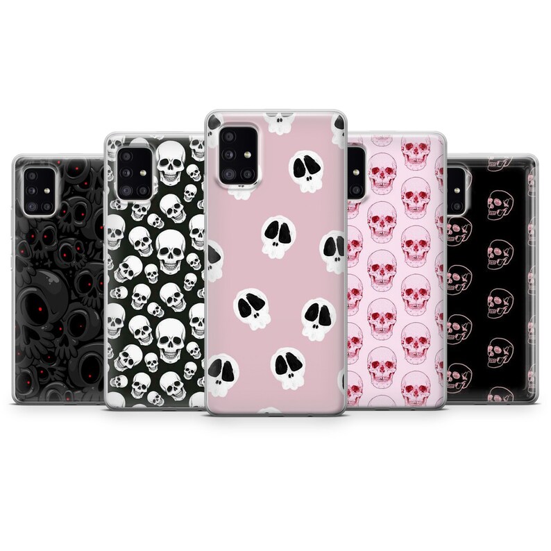 May include: Five different phone cases with skull designs. The cases are clear and show a variety of skull patterns in black, white, pink, and red.