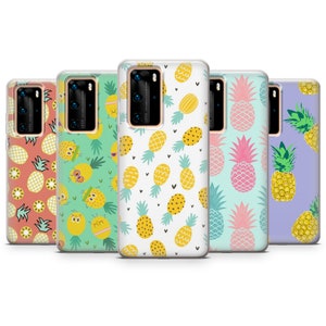 May include: A collection of five phone cases with colorful pineapple patterns. The cases feature designs in shades of pink, green, yellow, and purple. Each case has a different pineapple design, including cartoon-style illustrations.