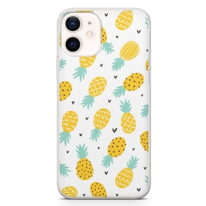 May include: Clear phone case with a repeating pattern of yellow pineapples with green tops and small black hearts on a white background. The phone case has a camera cutout and button covers.
