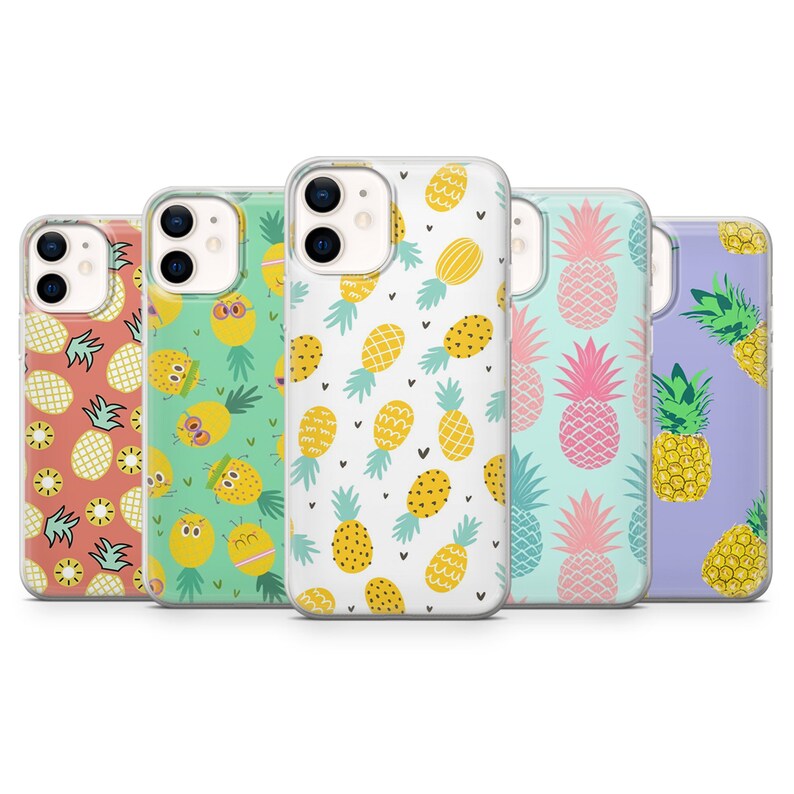 May include: Five phone cases with pineapple designs. The cases feature various colors, including coral, green, white, light blue, and purple. Each case has a different pineapple pattern, with some featuring cartoon-like designs.