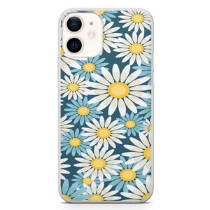 May include: Clear phone case with a daisy pattern. The design features white and light blue daisies with yellow centers on a dark blue background. The phone case is designed to fit a smartphone.