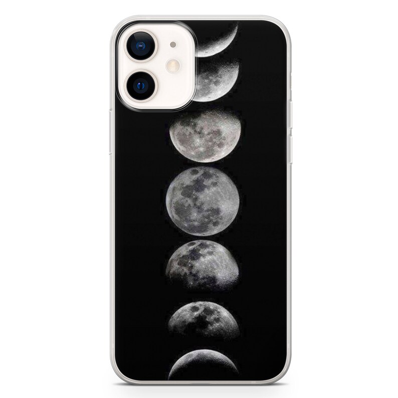 May include: A clear phone case with a black background and a white image of the moon in different phases.