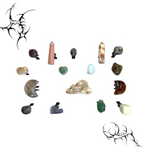 May include: A collection of various shaped and colored crystals, including a pink crystal point, a green heart-shaped crystal, a white cloud-shaped crystal, a brown crescent moon-shaped crystal, and a variety of other crystals in different shapes and colors.