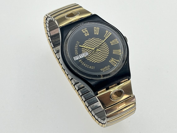 Swatch day date hotsell