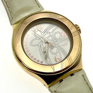 Swatch Irony Rosa Perlata YNG101 Gold Tone Watch for Women