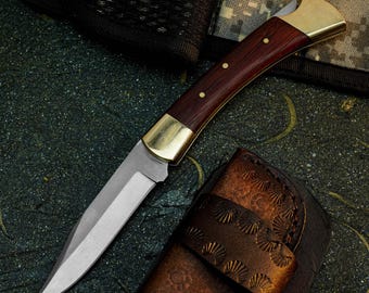 Navaja plegable de acero D2 con mango de resina y funda de cuero
