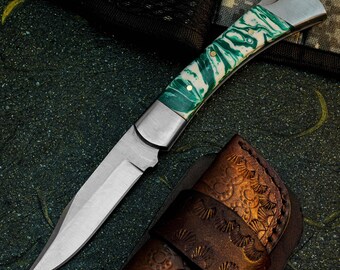 Navaja plegable de acero D2 con mango de resina y funda de cuero
