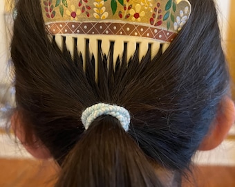 Vintage hair combs in various styles and materials