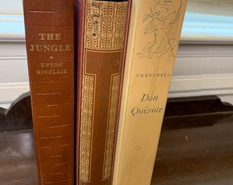 1960s Heritage Press books- two plays puritans - sea wolf - aquinas - Connecticut yankee - Billy budd - cyrano - candide - germinal - butler