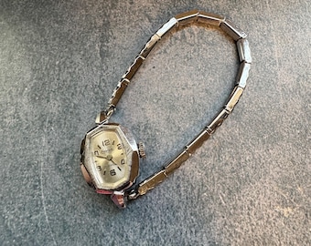 Vintage Eldorado wrist watch - 17 Jewel- silver tone - stretch band - stainless back