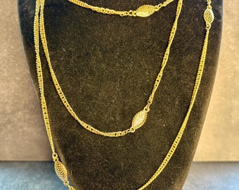 Vintage Monet 55" necklace - gold tone - classic - loopable