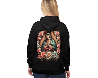 May include: Black hooded sweatshirt featuring a colorful illustration of the Virgin Mary surrounded by roses. The artwork depicts the Virgin Mary in a teal and red robe, with a gold halo. The roses are in shades of pink, red, and white.