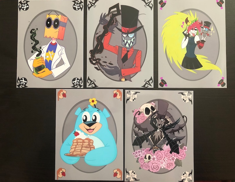 May include: Set of five illustrated cards featuring characters from the animated series "Villainous". The characters are:  Dr. Flug, Black Hat, 5.0.5, Demencia, and  the  character  from  the  "Hazbin Hotel"  series,  Angel Dust.  Each card has a gray background with a black border and a white oval in the center. The characters are drawn in a cartoon style with bright colors.