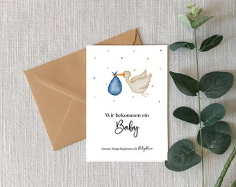 May include: A white stork with a blue bag in its beak, flying over a white background with blue and orange confetti. The text reads "Wir bekommen ein Baby Grosse Dinge beginnen oft blitzschnell."