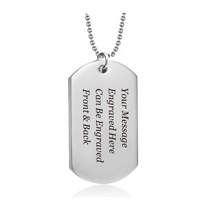 May include: Silver dog tag necklace with a ball chain. The tag is blank and can be engraved on the front and back. The text on the tag reads "Your Message Engraved Here Can Be Engraved Front & Back"