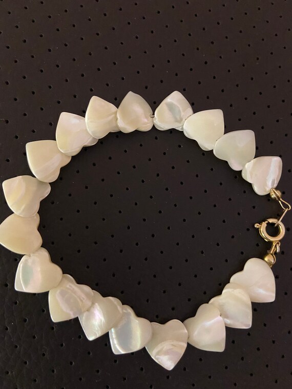 Vintage gold tone natural mother pearl heart shape