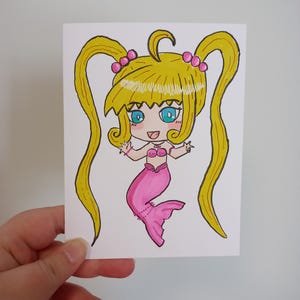 Cartão de felicitações em branco Chibi de melodia de sereia desenhado à mão