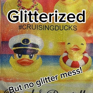 May include: A glittery image of three yellow rubber ducks with the text "Glitterized #CRUISINGDUCKS" and "But no glitter mess! Brad & Danielle".