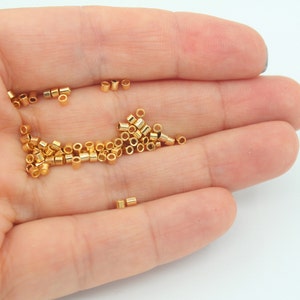 50 stks 2x1,5mm 24k glanzend goud krimp kralen, krimp buis, kleine krimp, vergulde sieraden bevindingen, stopper kralen, vergulde benodigdheden, FND020
