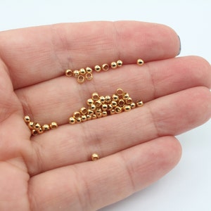 50 stks 2,5mm 24K glanzend goud krimp kralen, krimp covers, kleine krimp, vergulde sieraden bevindingen, stopper kralen, vergulde benodigdheden, FND018
