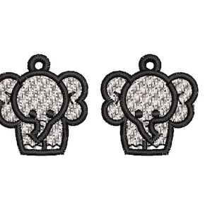 May include: Two black and white embroidered elephant charms with a gray textured fill. The elephants are facing forward with their trunks curled up.