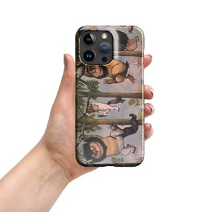 May include: A phone case with a colorful illustration of whimsical creatures climbing trees. The case features a white background with green trees and a blue sky. The creatures are a mix of brown, white, and black.