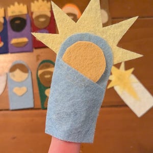 Patroon kerststal vingerpop