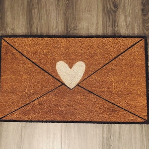 Felpudo con carta de amor para San Valentín