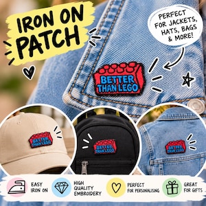 May include: A rectangular iron-on patch featuring a red plastic building block design with blue embroidered text that reads BETTER THAN LEGO. The patch is shown attached to a blue denim jacket, a beige baseball cap, and a black backpack.