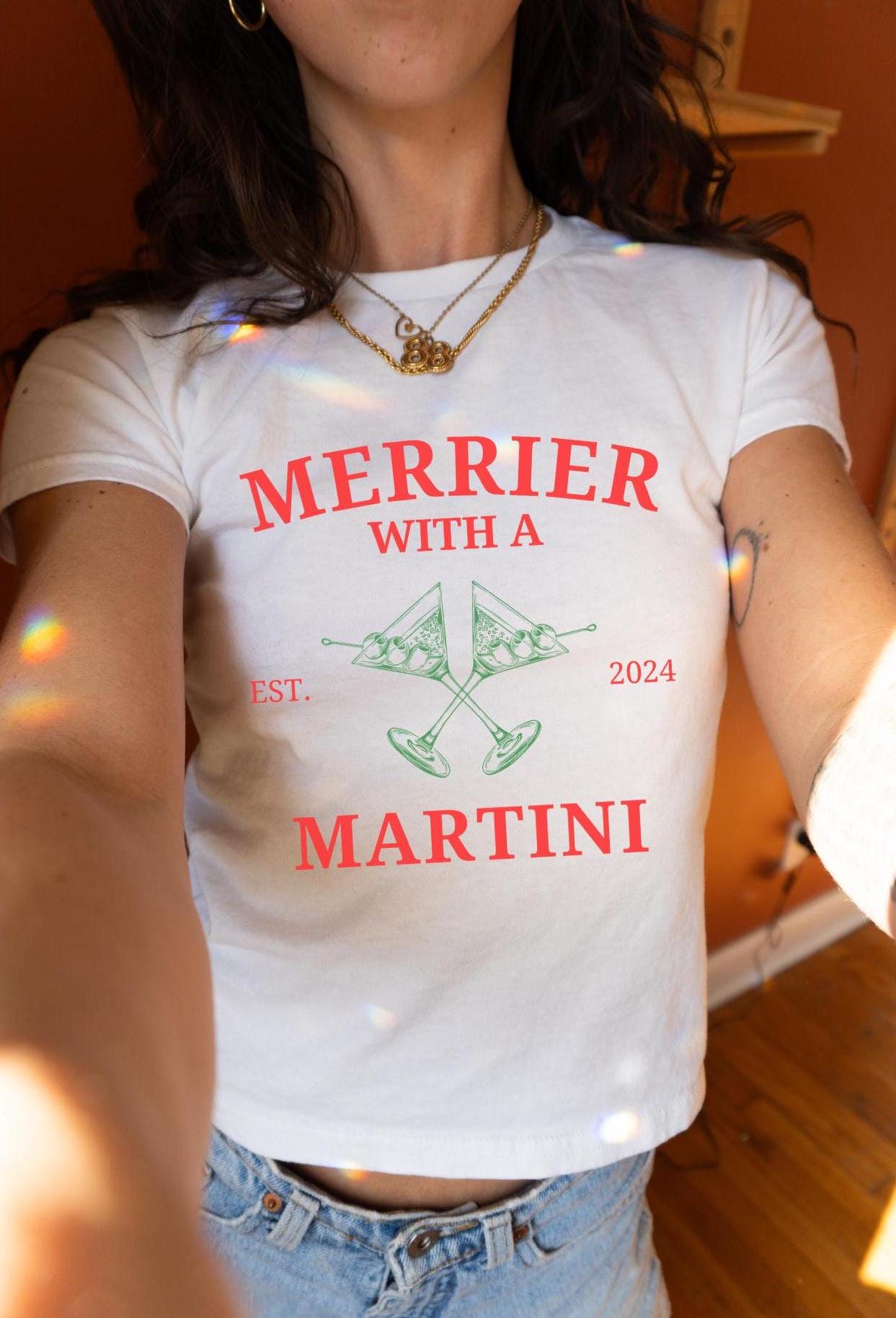 Merrier with a Martini Baby Tee Alcohol Tank Tops Tini Time Shirt GF Gift Ideas Secret Santa Little Gift Bday Gifts for Friends X Mas