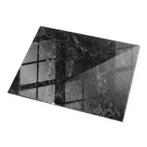 May include: A rectangular black marble-patterned cutting board with a glossy finish. The surface has white veining throughout, and the edges are smooth. The board reflects light, creating a shiny appearance. The overall design is modern and elegant.