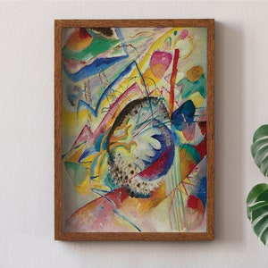 May include: Abstract painting in a wooden frame. The painting features a variety of colours, including blue, yellow, red, and green. The colours are arranged in a dynamic and abstract way, creating a sense of movement and energy.