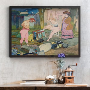 May include: A vintage painting depicting three figures in a theatrical setting. A man in pink shorts and a woman in a pink dress are standing near a stage prop, while another woman in a polka dot dress watches. The painting is framed in a dark wood frame.