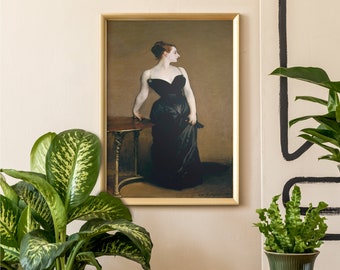 May include: A framed painting of a woman in a black dress standing in front of a table. The woman is looking to the right and has her hand resting on the table. The painting is set against a light beige wall.