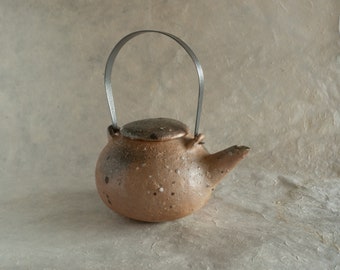 Peach stone teapot