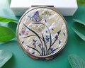 Mother of Pearl Orchid Compact Hand Mirror Double Sided Pocket Size Makeup Magnifying Cosmetic Purse product logo