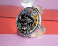 Mother of Pearl Compact Mirror: Dual Magnifying Pocket Beauty Accessory product logo
