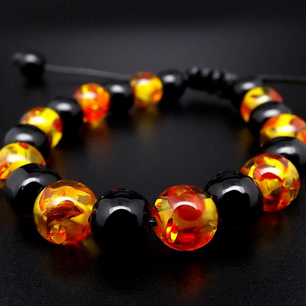 Bracelet homme ou femme ,Perles Onyx et perles en résine dragon de feu sur cordon noir réglable très tendance.