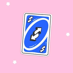 May include: A blue Uno reverse card with white arrows on a pink background. The card features a large, central reverse symbol and smaller corner symbols. The card is outlined in white.
