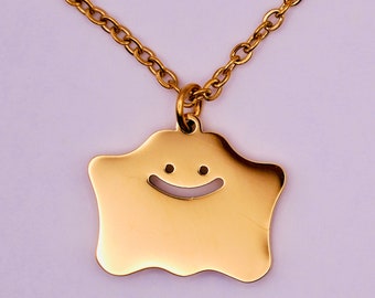 Cute Monster necklace pendant in gold and silver