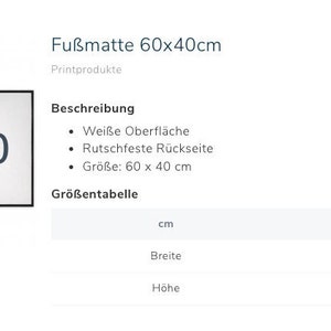 Puede incluir: Una alfombra de puerta rectangular blanca con un borde negro, que muestra las dimensiones "60x40". La alfombra mide 60 cm por 40 cm. El texto "Fu&szlig;matte 60x40cm" es visible en la parte superior. Tiene un respaldo antideslizante.